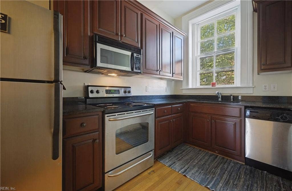 Kitchen with stainless steel appliances and granite countertops