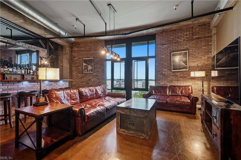 Cozy Living Room with plenty of space to relax while your drinks and dinner are served!