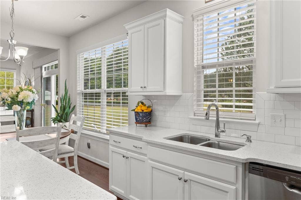White Shaker Cabinets and White Subway Tile backsplah