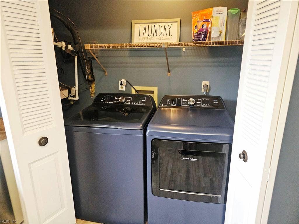 Laundry/ utility closet off of kitchen.