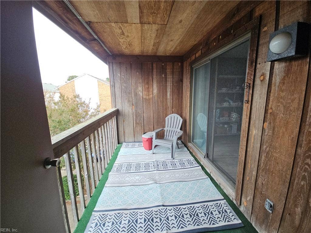 Private back balcony offers a great space to sit outside and relax.
