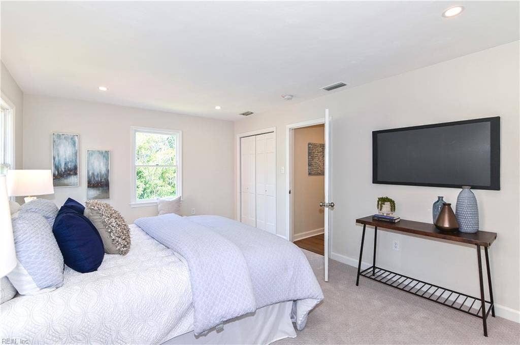 Primary suite with double closets.