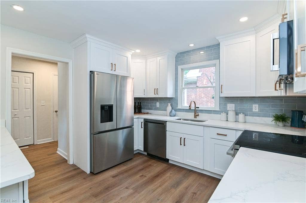 Welcome too 1109 Buckingham Ave, a luxuriously renovated brick classic.