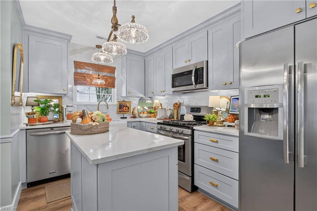 All updated cabinetry and lighting.