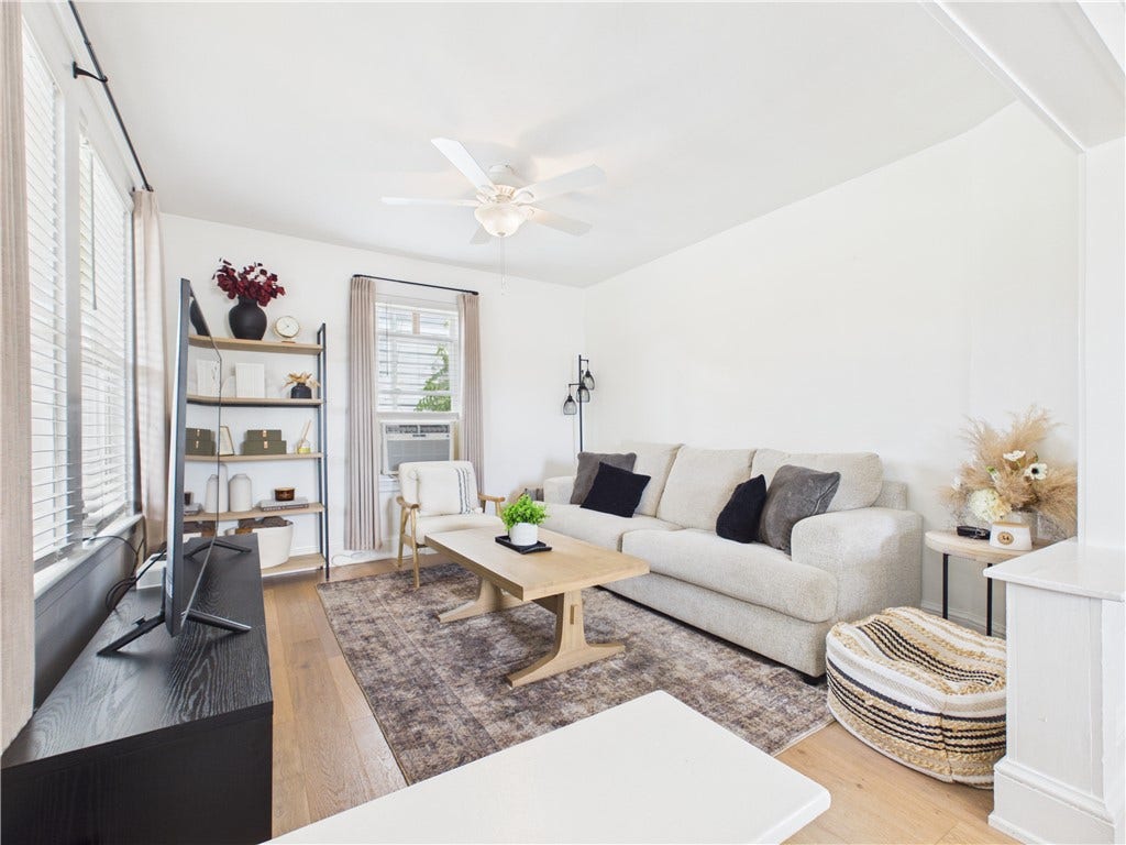 36 Bellevue Avenue, North Smithfield, RI 02896 Welcoming living room at 36 Bellevue Avenue in North Smithfield, RI, offering a spacious first impression with flexible room for everyday living and entertaining.