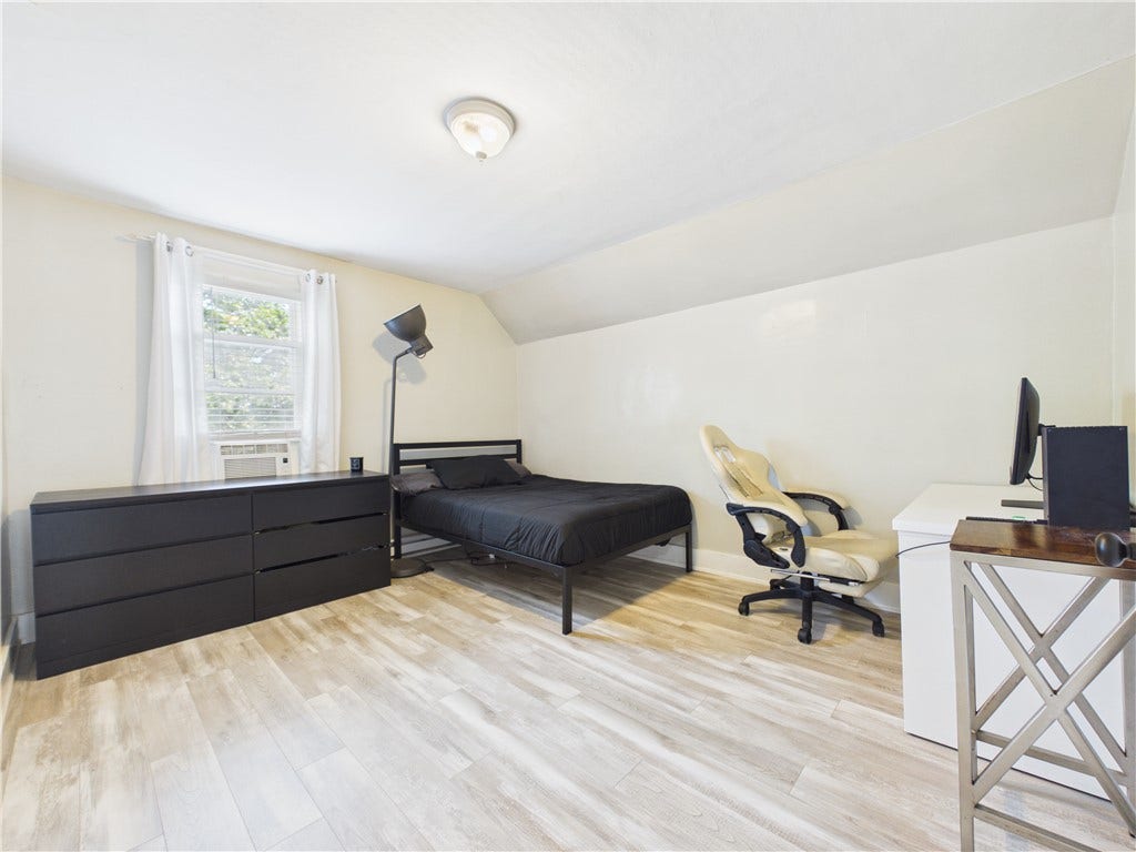 36 Bellevue Avenue, North Smithfield, RI 02896 A third spacious second-floor bedroom with flexible layout options for sleeping, studying, gaming, or working from home.