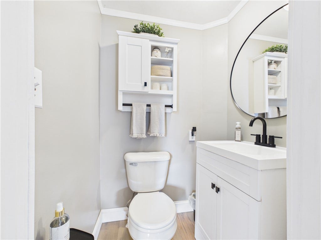 36 Bellevue Avenue, North Smithfield, RI 02896 Convenient first-floor half bath at 36 Bellevue Avenue in North Smithfield, RI, providing easy access for guests and everyday living.