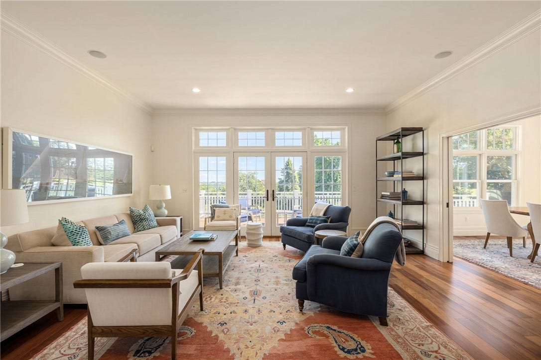 High ceilings and Deck with Water views!