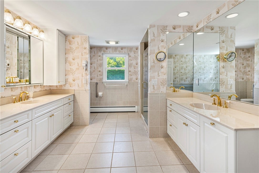 149 Nanaquaket Road, Tiverton, RI 02878 1st floor primary bathroom.
