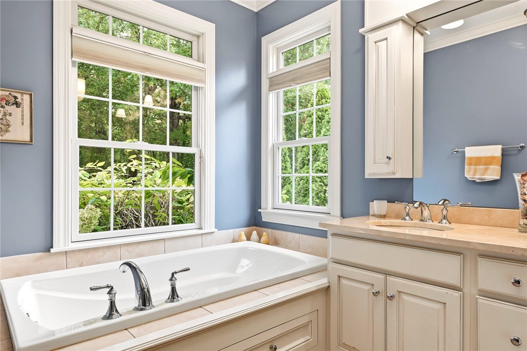 95 Fry Brook Drive, East Greenwich, RI 02818 A serene, spa-inspired primary bath featuring a beautifully integrated soaking tub.