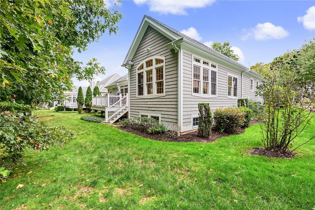 95 Fry Brook Drive, East Greenwich, RI 02818 Attractive rear exterior showcasing the private deck.