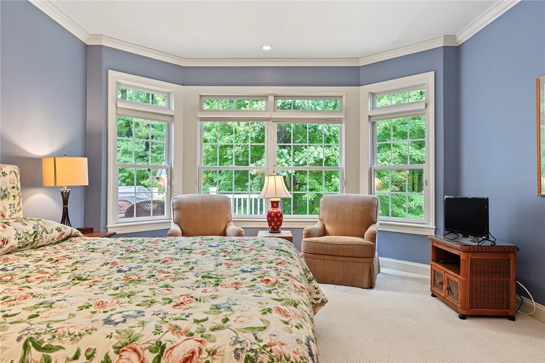 95 Fry Brook Drive, East Greenwich, RI 02818 A generous sitting area creates a peaceful, private retreat.