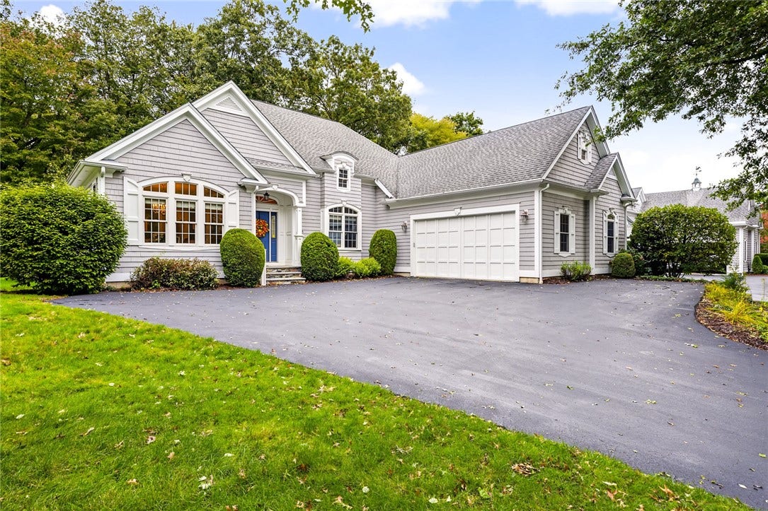 95 Fry Brook Drive, East Greenwich, RI 02818 An elegant freestanding residence showcasing classic New England architecture.