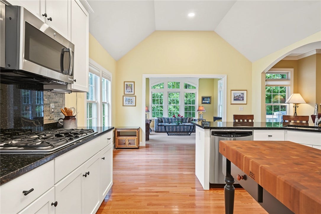 95 Fry Brook Drive, East Greenwich, RI 02818 A bright, beautifully appointed kitchen featuring vaulted ceilings.