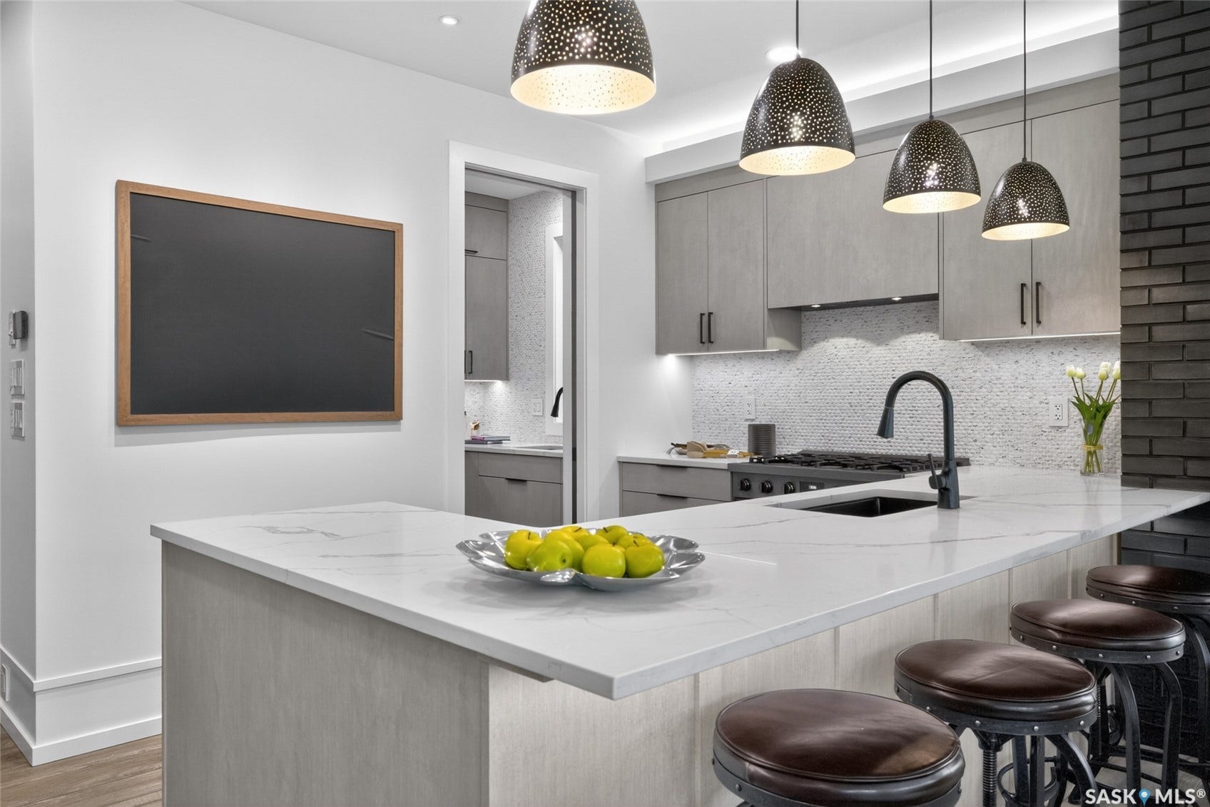 Quartz Countertops, upscale cabinetry, warming drawer, butlers pantry, exceptional.