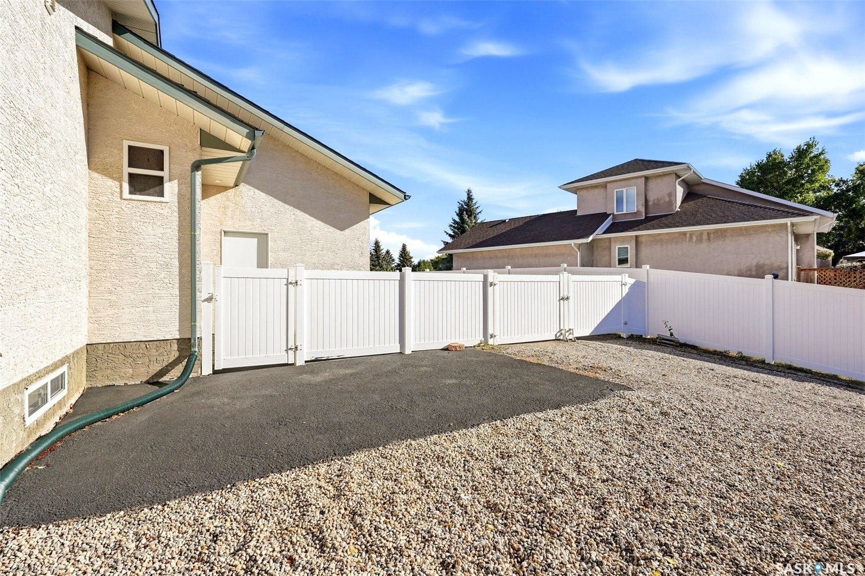 White vinyl fencing enclosing the property