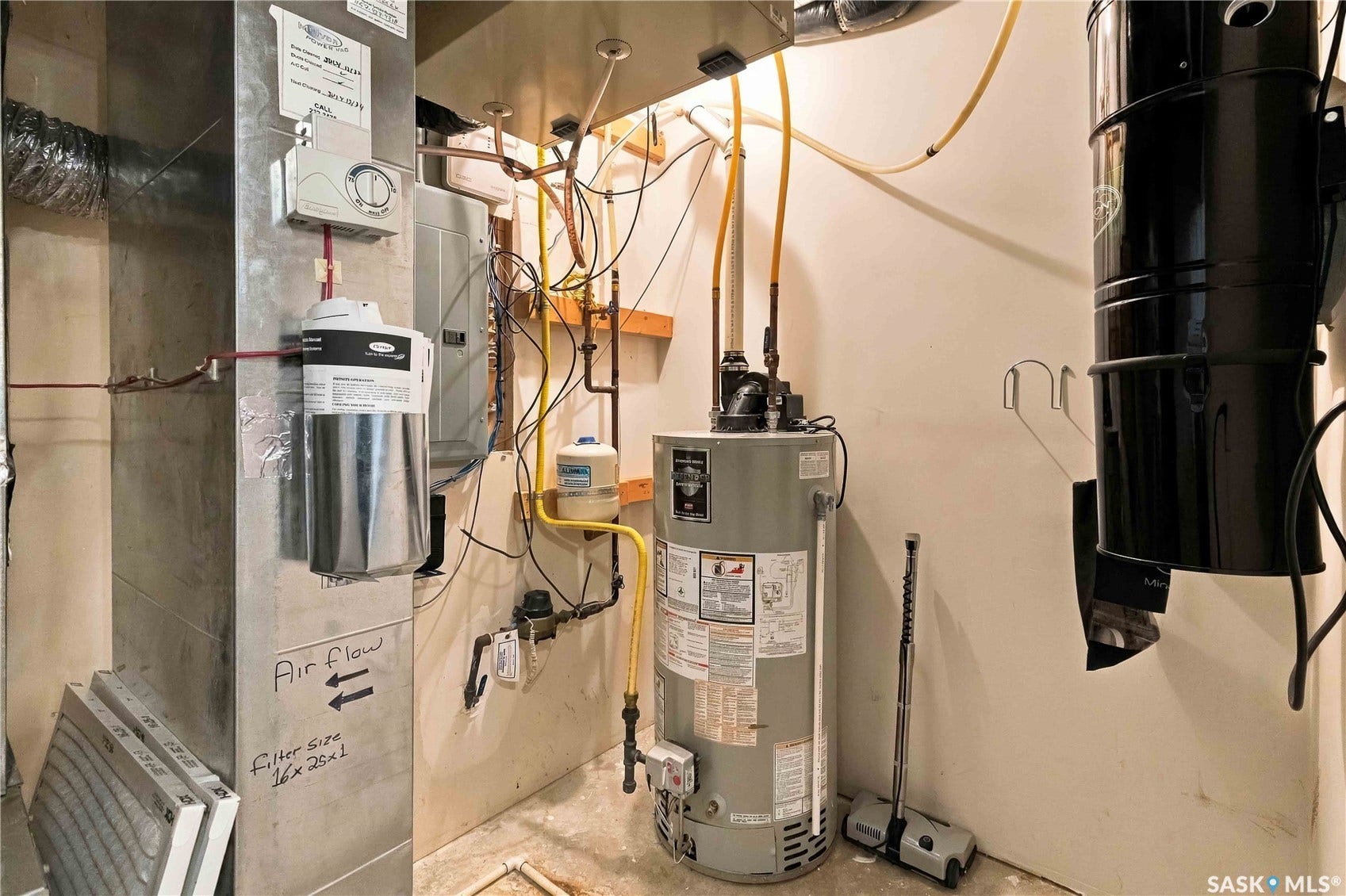 Water heater, central HVAC system, water filtration unit, and central vacuum system