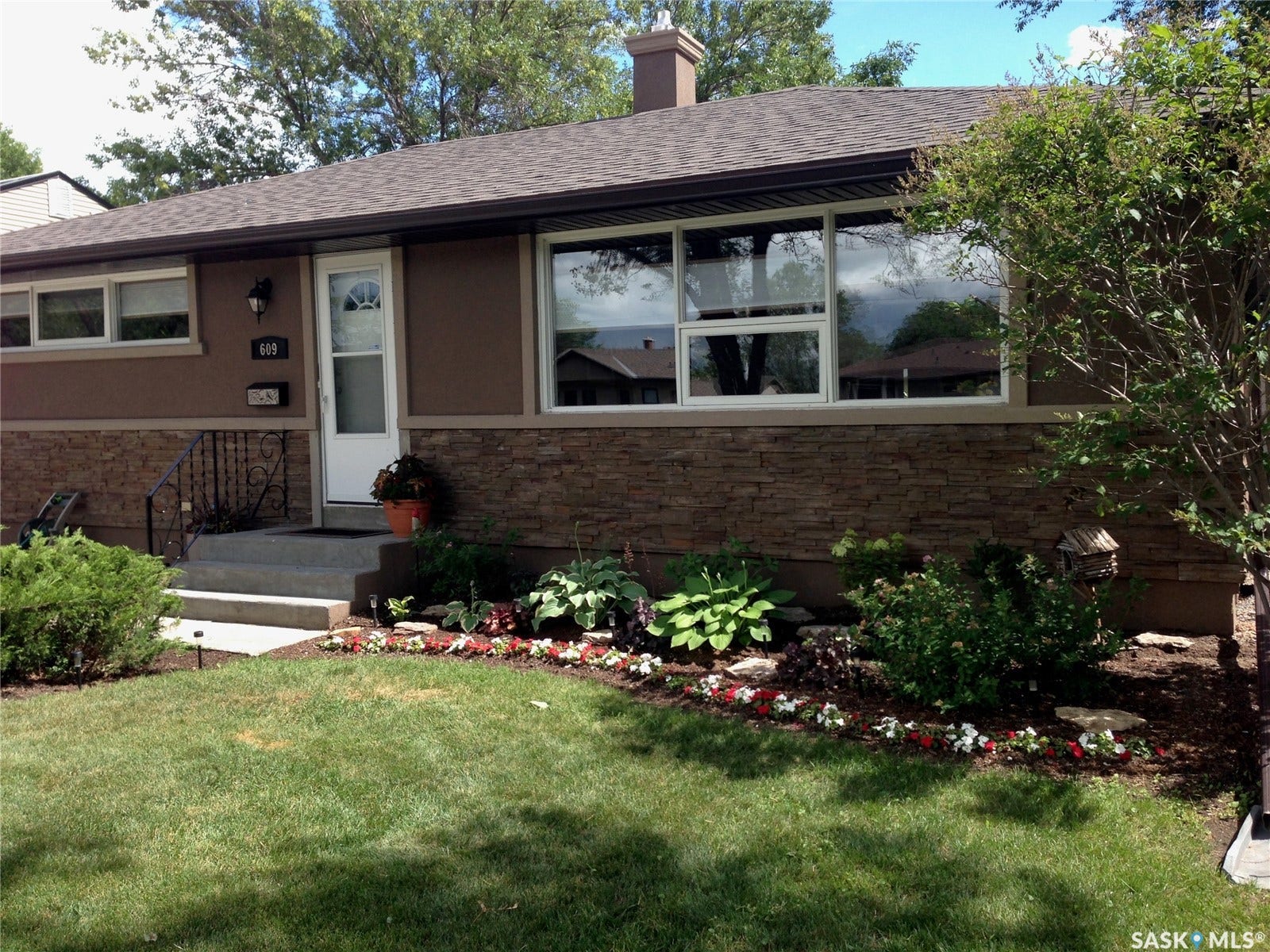 front of home in summer