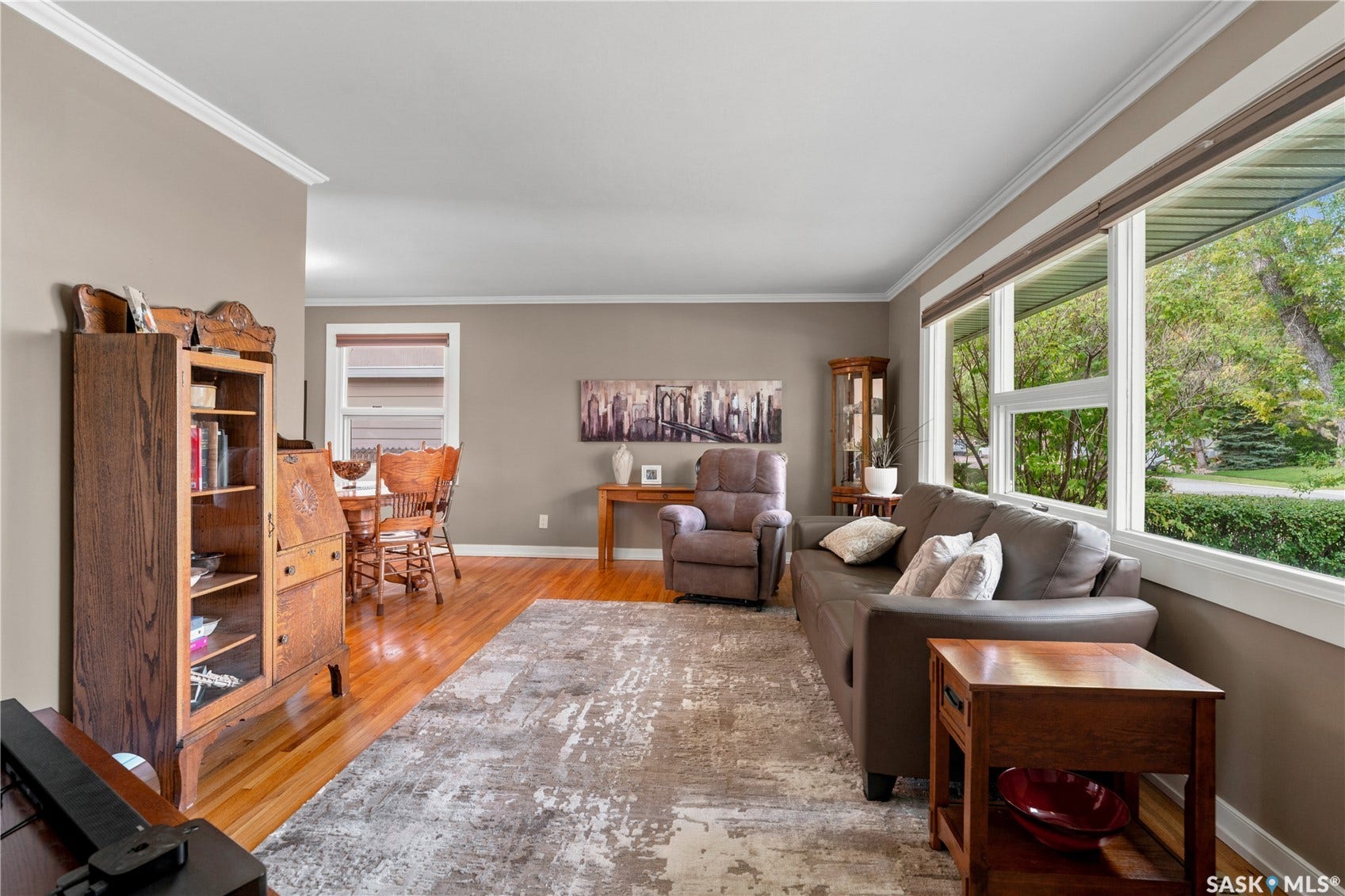 living room with large windows overlooking front