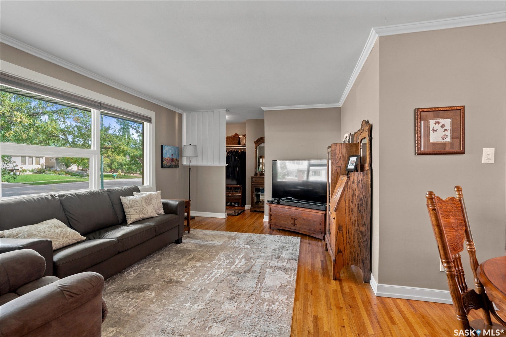 living room with large windows overlooking front
