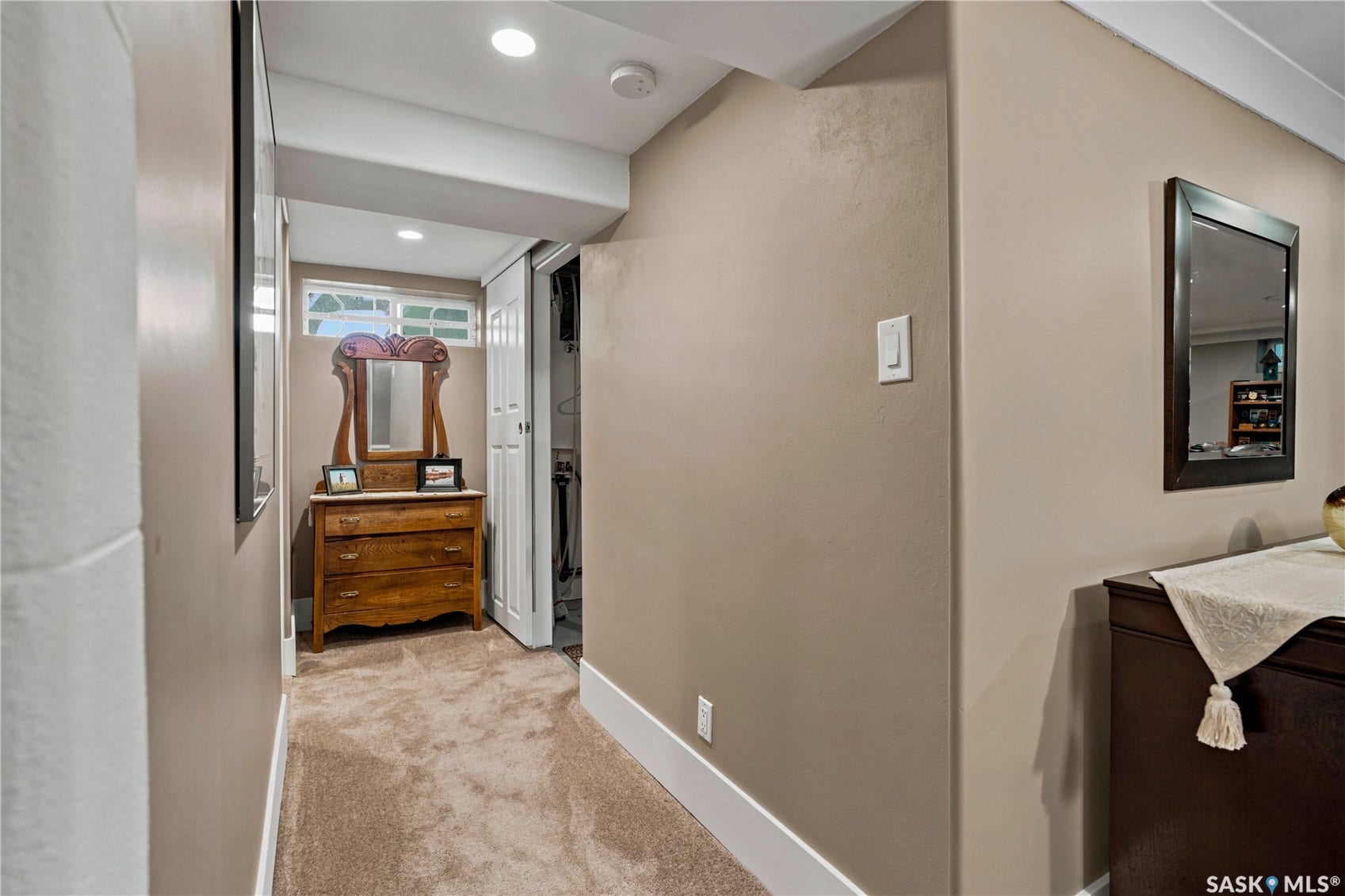 hallway from bedroom to utility room and bathroom
