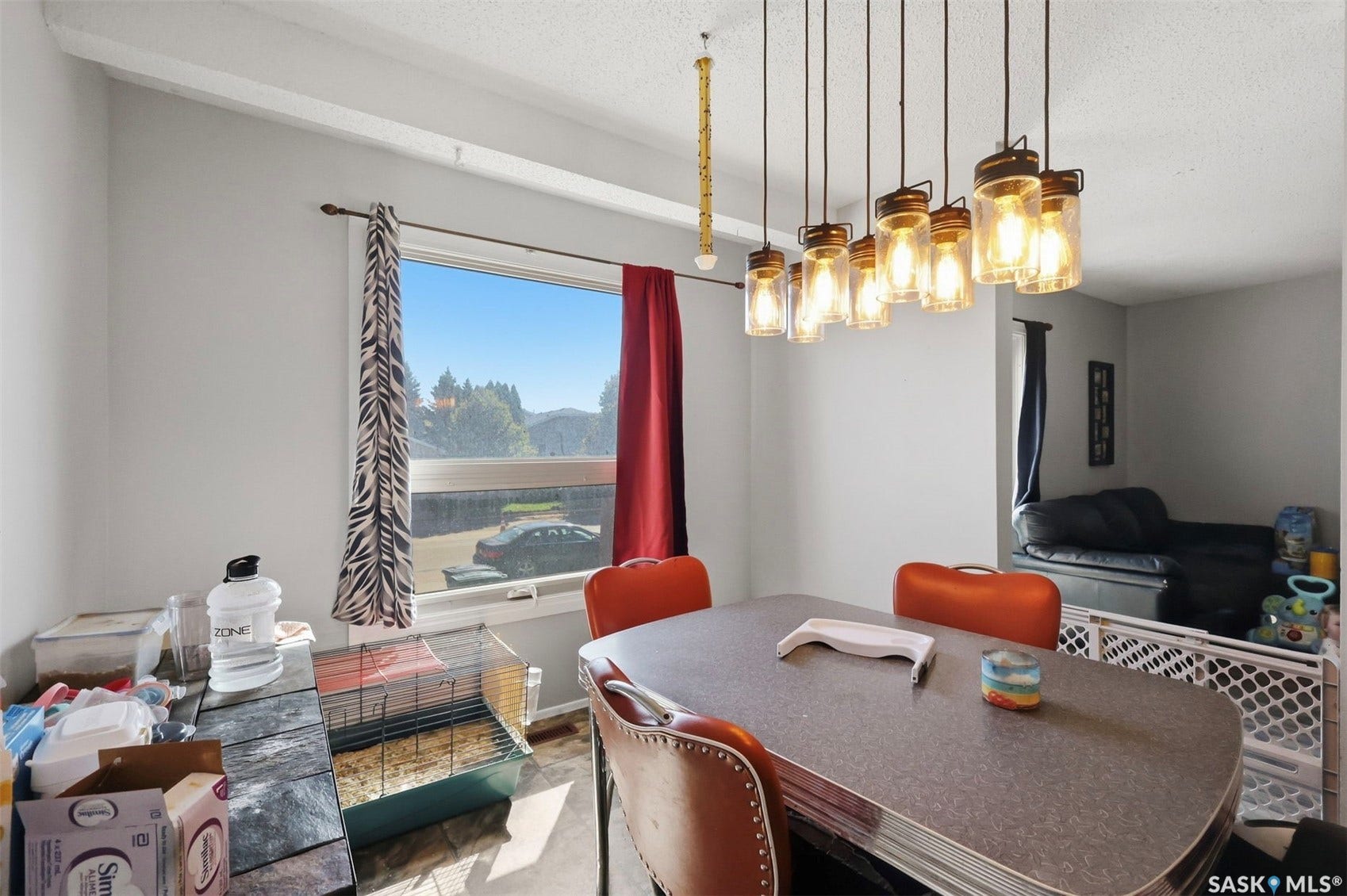 Ceiling-mounted multi-light fixture with glass jar shades