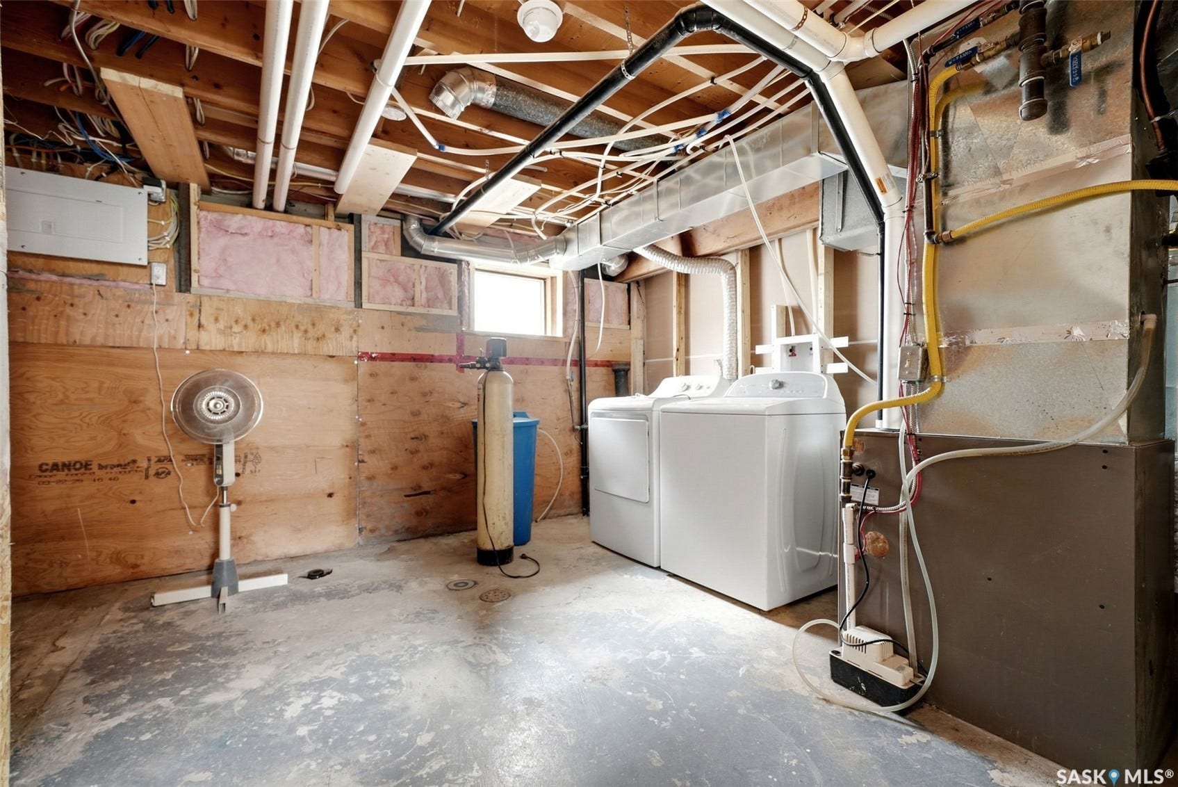 1601 Lacon Street, Regina SK S4N 1Z5 Utility space with exposed ceiling joists, electrical conduit, and plumbing lines