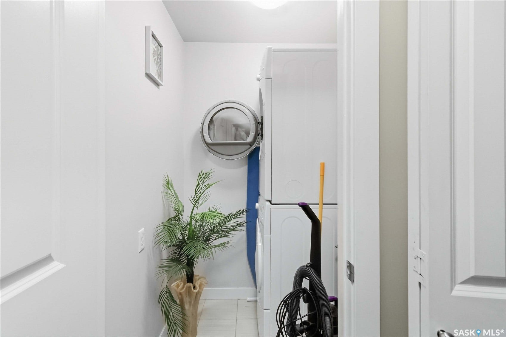 Laundry area featuring a stackable washer and dryer