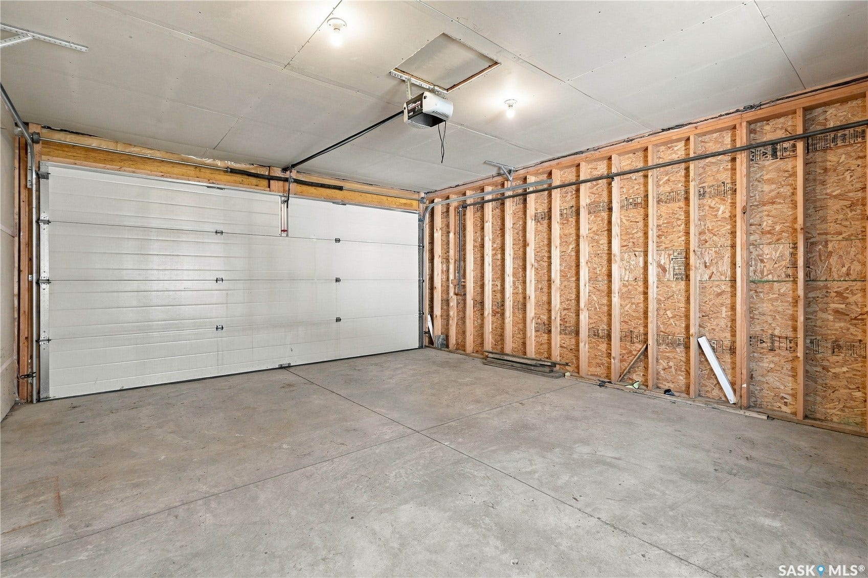 Full-width garage door with automatic opener