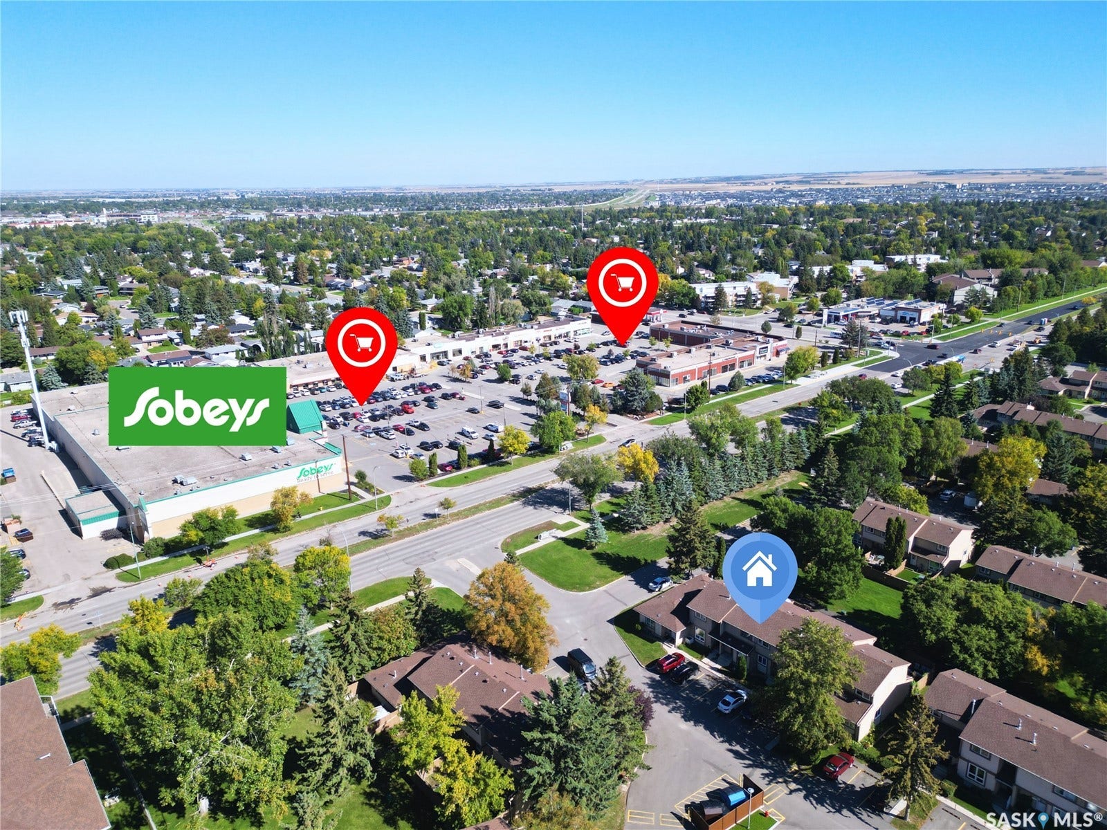 Residential area with nearby commercial developments, featuring a retail store and additional businesses