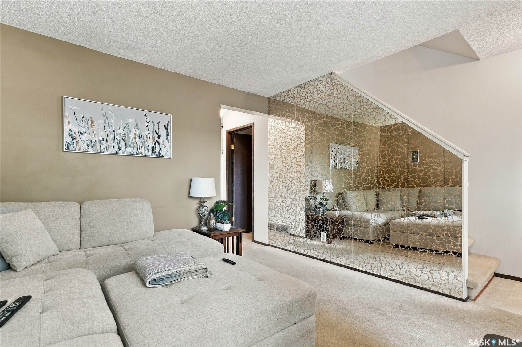 Textured mirrored wall paneling