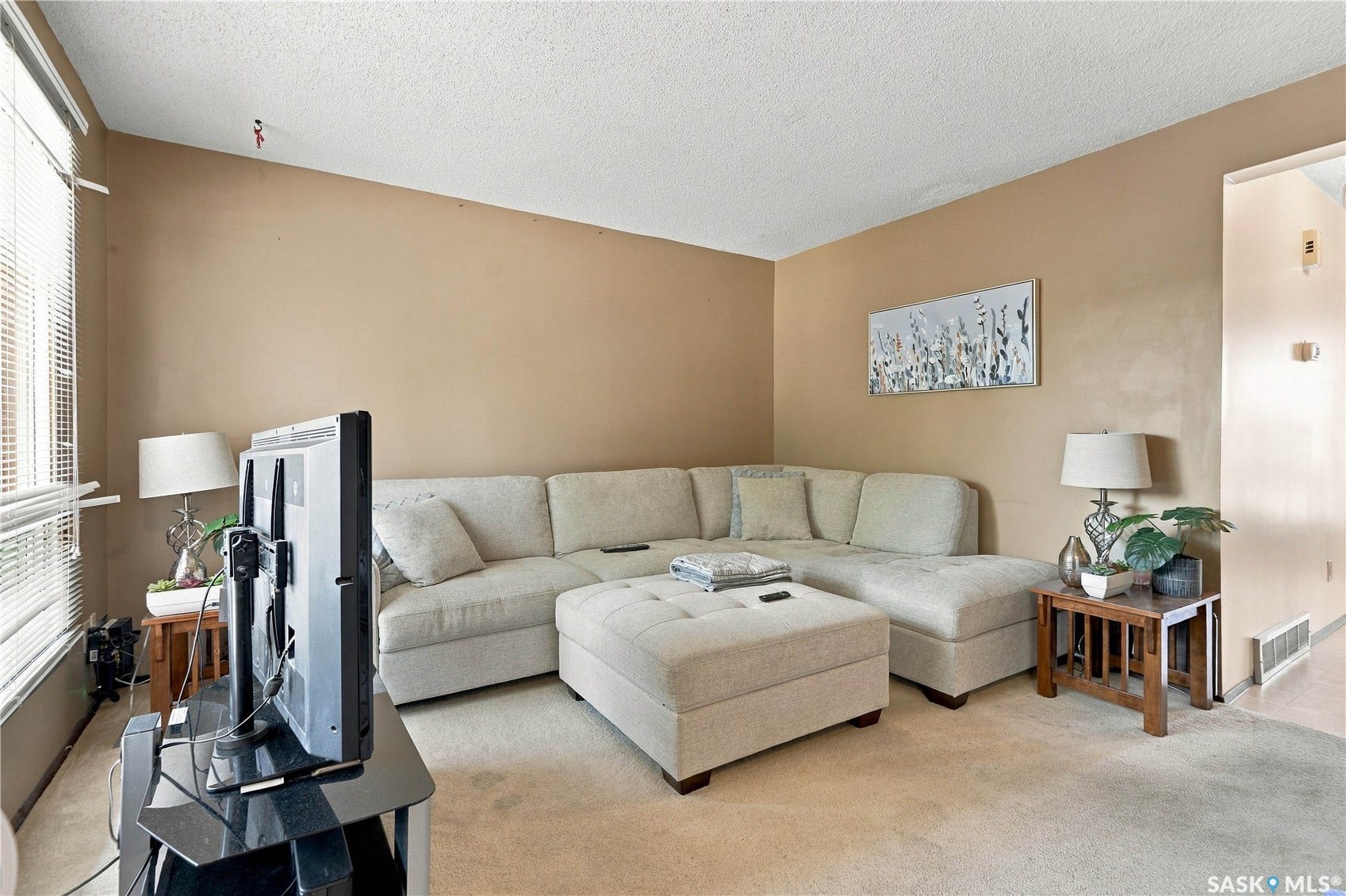 Wall-to-wall carpeting with neutral wall tones