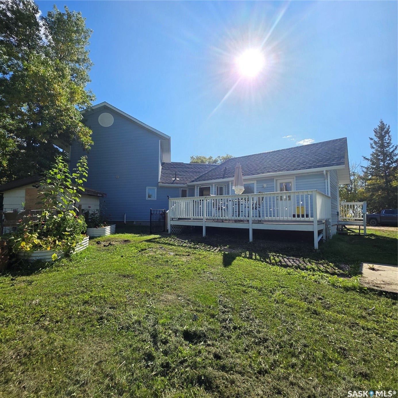 Expansive rear deck with white railings