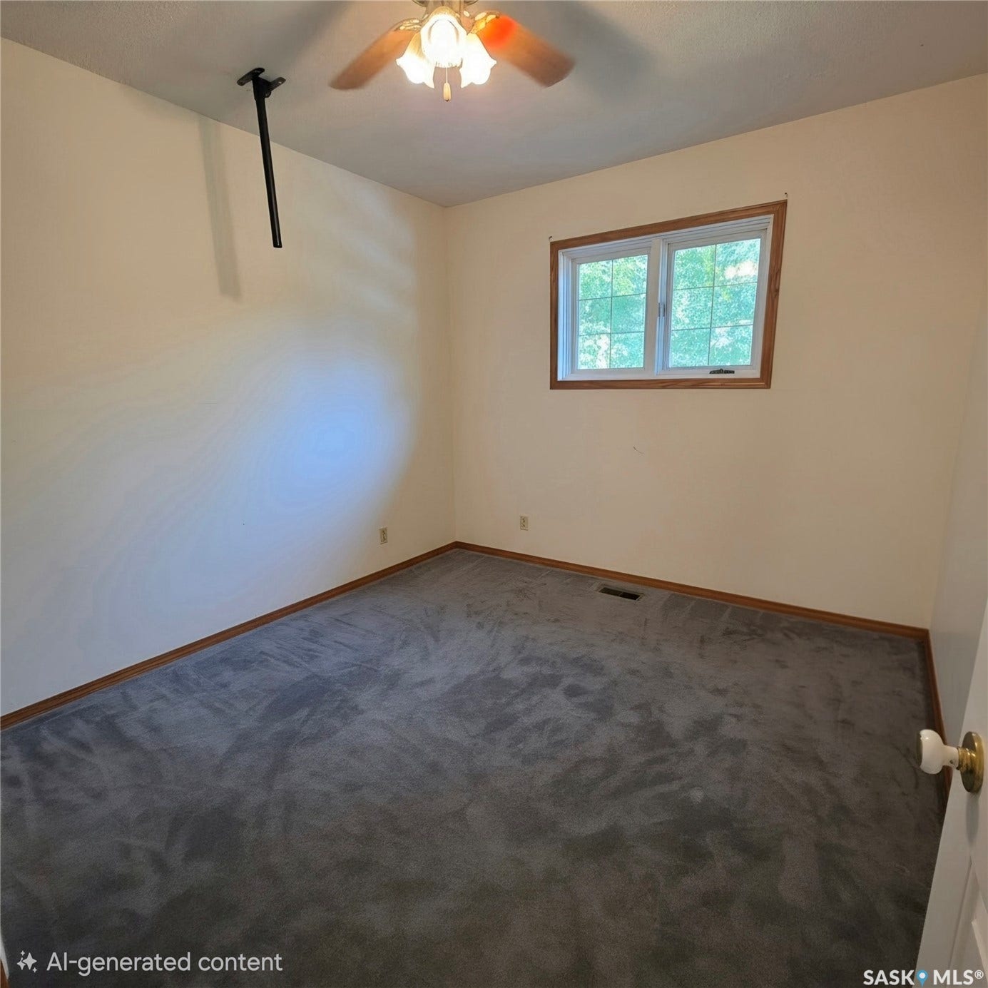 Recessed window with wood-finish trim, neutral wall paint, gray carpeting, and a ceiling fan with integrated lighting
