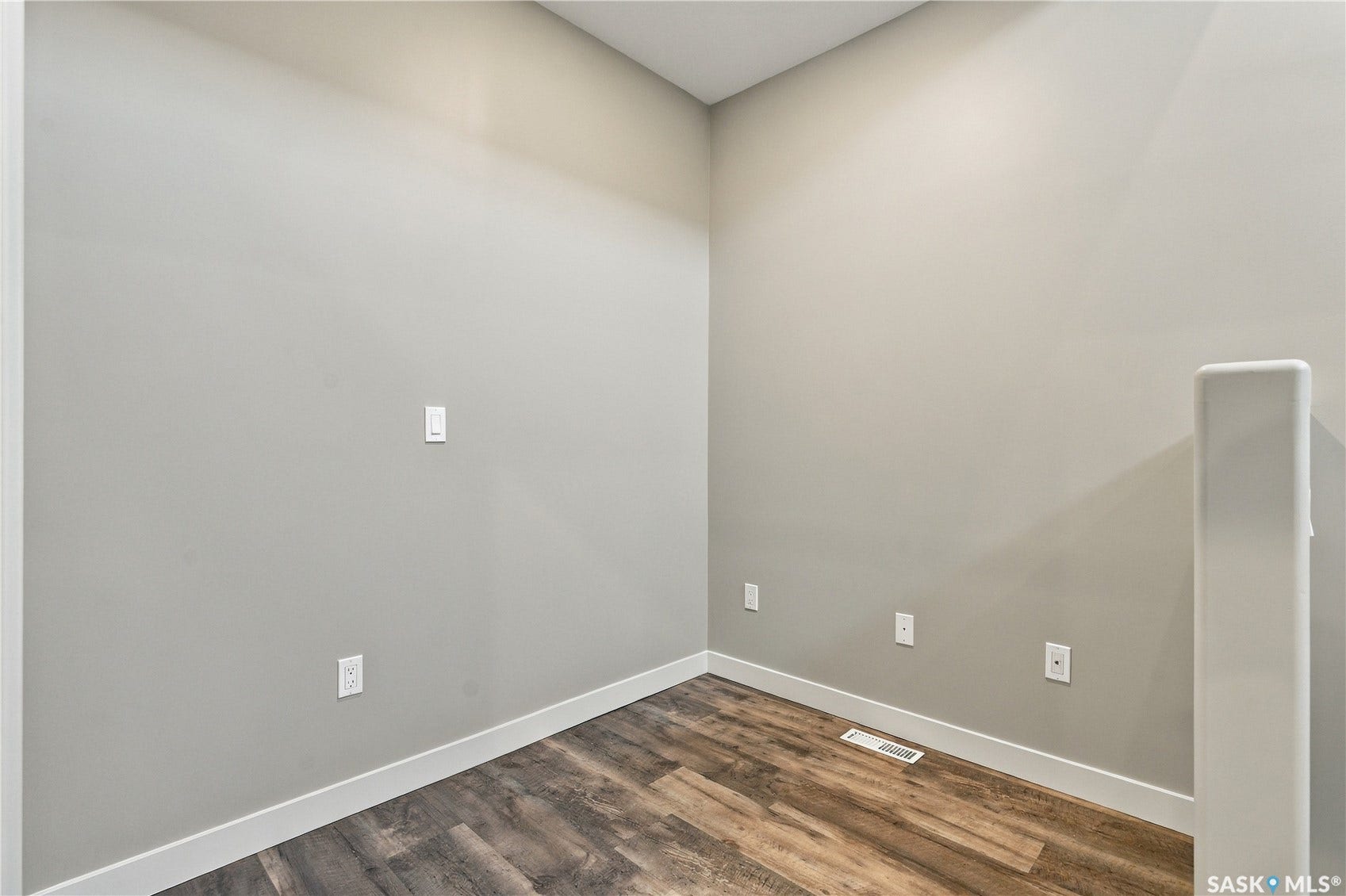 Wood-finish flooring with crisp white trim