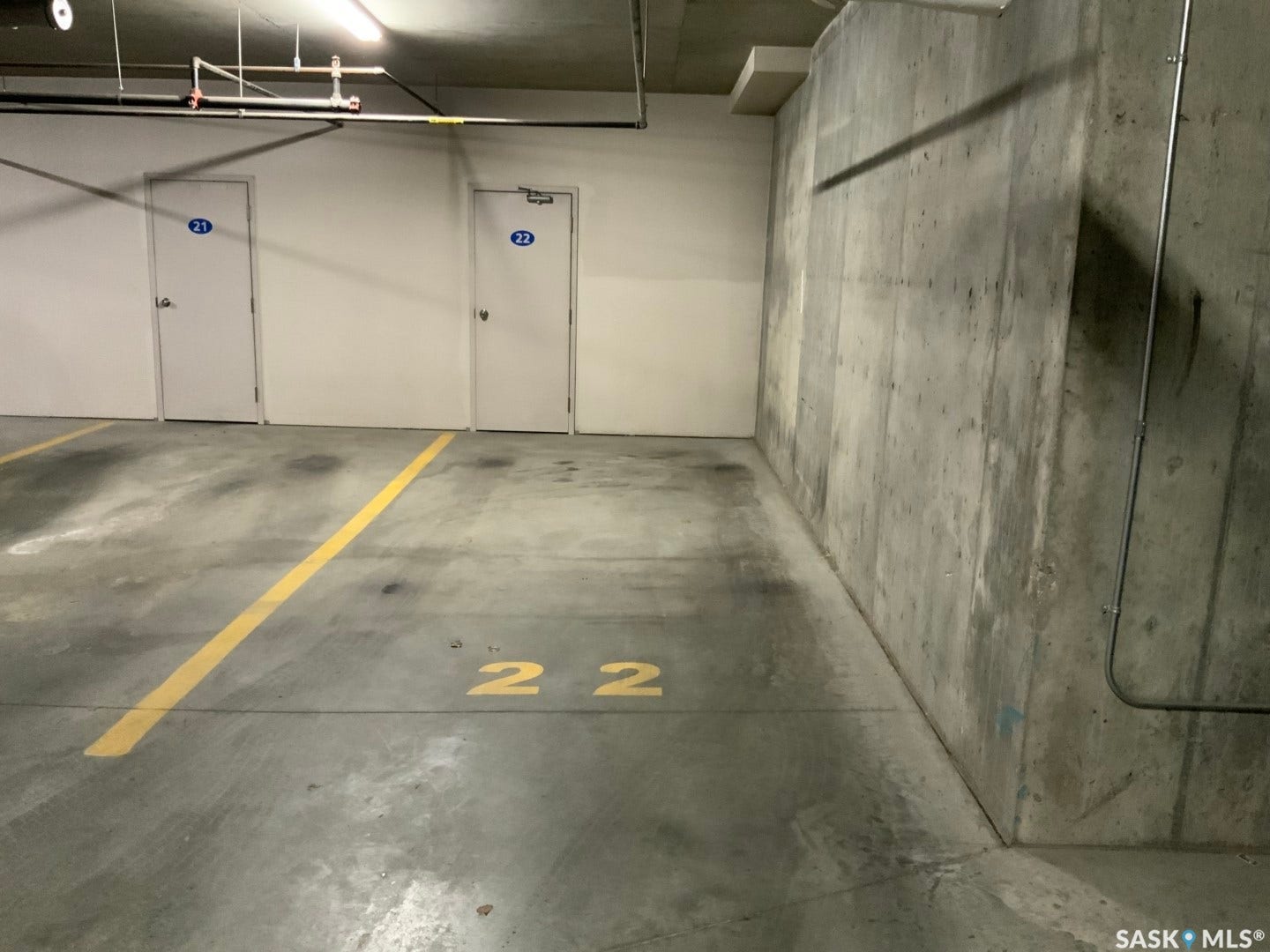 Concrete flooring with painted yellow markings