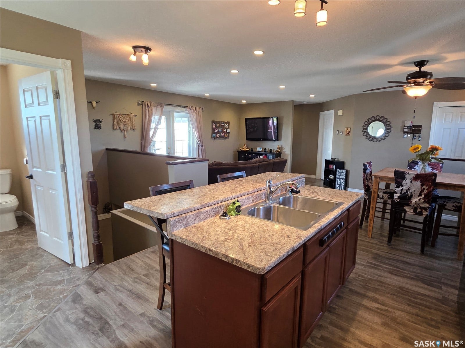 Kitchen island with dual stainless steel sink and integrated dishwasher