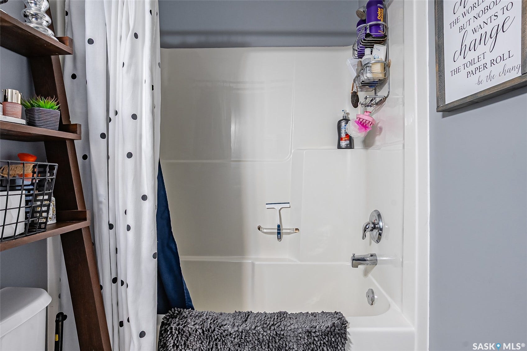 White bath/shower combination with chrome fixtures