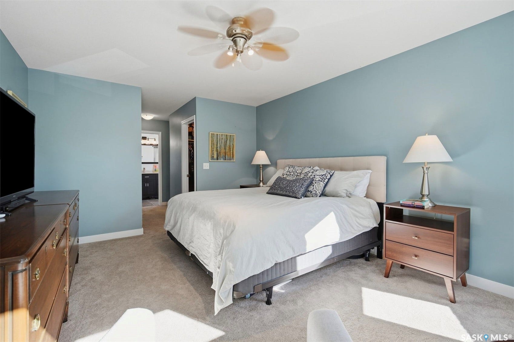 Wall-to-wall carpeting and neutral wall tones
