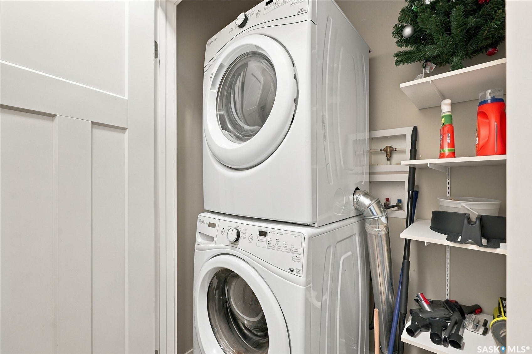 Stacked washer and dryer units