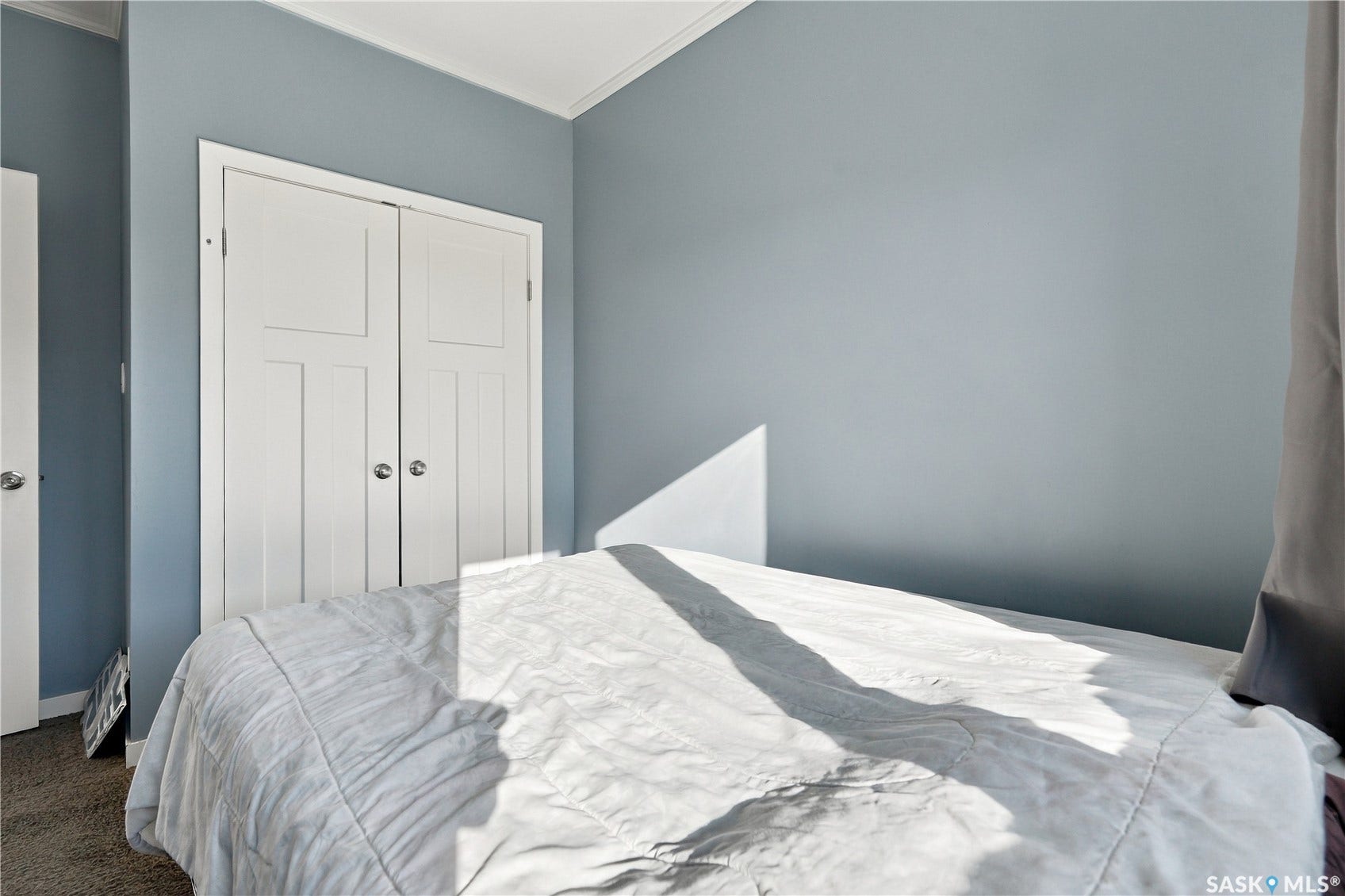 Two-panel closet doors with spherical hardware