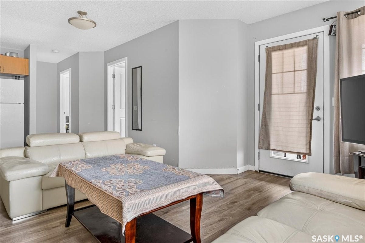 5051 James Hill Road, #107, Regina SK S4W 0B9 Wood-finish flooring throughout