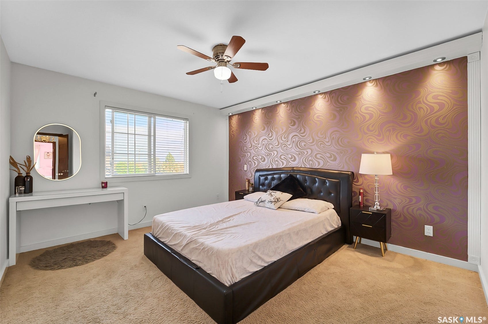 Recessed wall lighting illuminates a textured accent wall