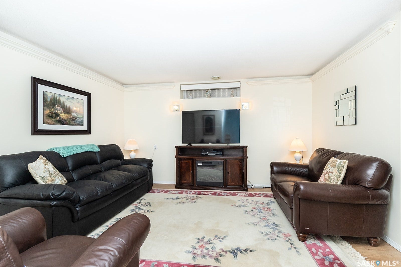 Family room featuring laminate flooring