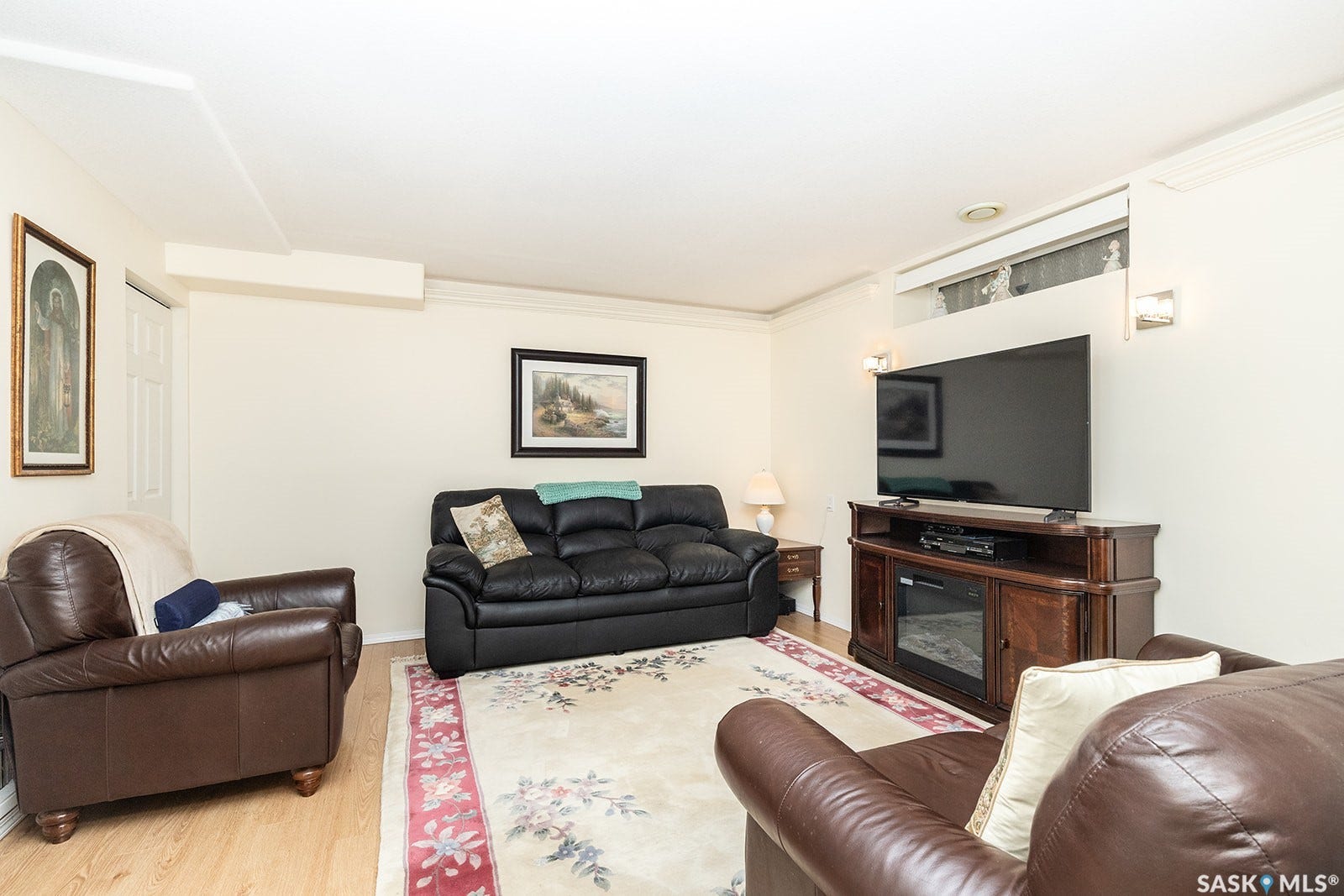 Family room featuring laminate flooring