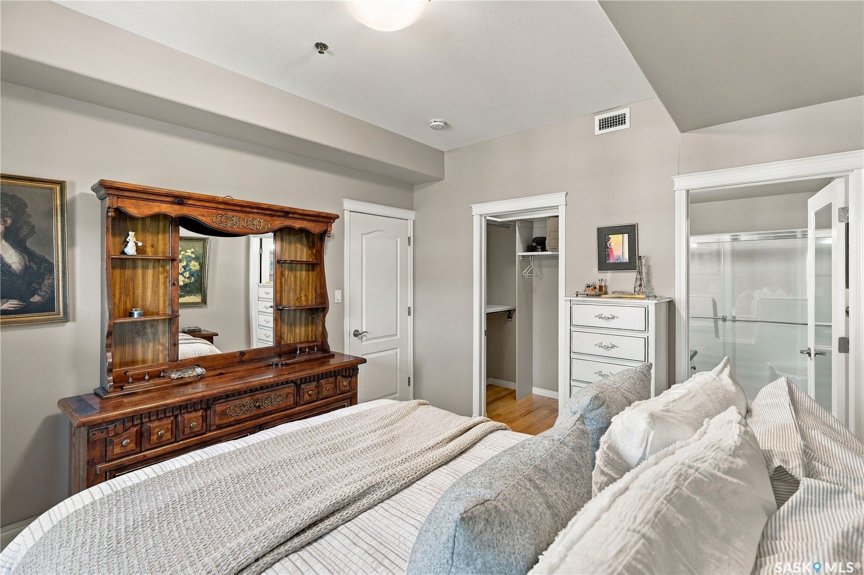 Recessed lighting, painted walls, and wood-finish flooring