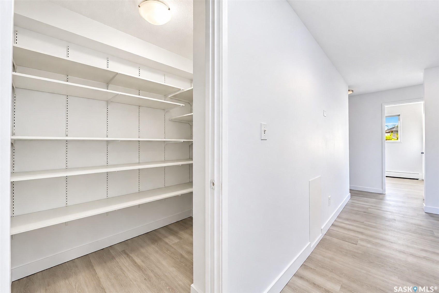 Integrated storage with adjustable shelving