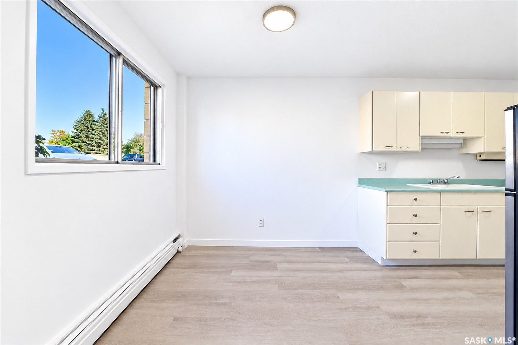 Wood-finish flooring with baseboard heating