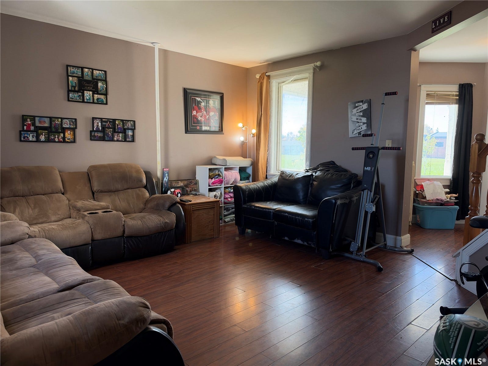 Wood-finish flooring throughout, complemented by neutral wall tones