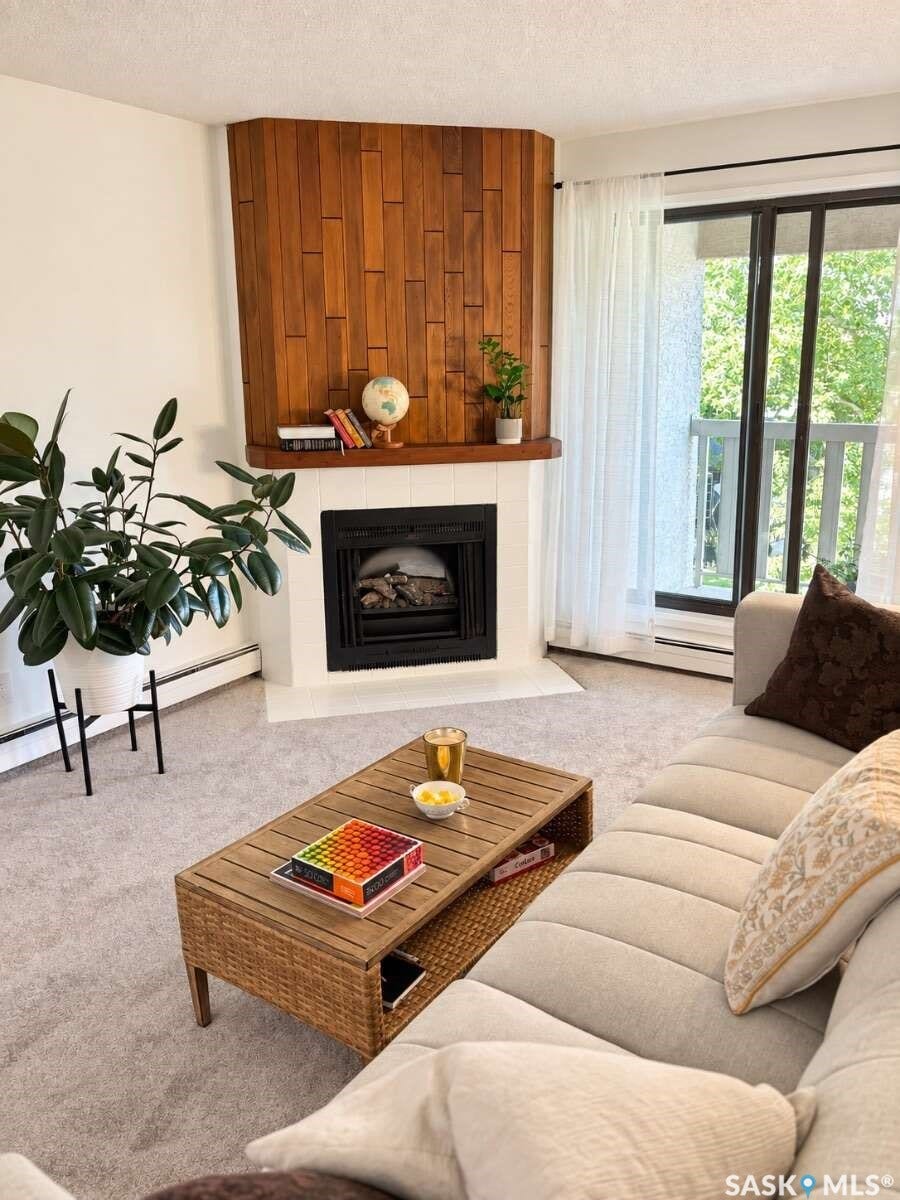 Built-in fireplace with a white mantel and wood-paneled surround